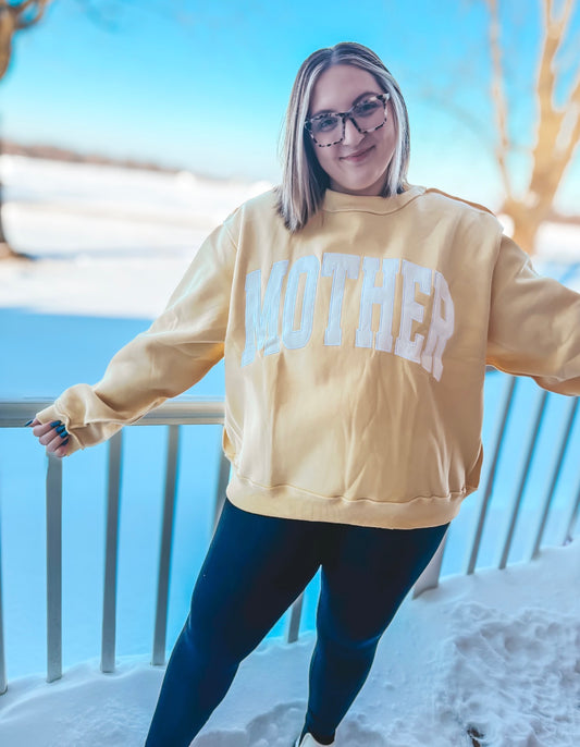 yellow mother embroidered mock neck