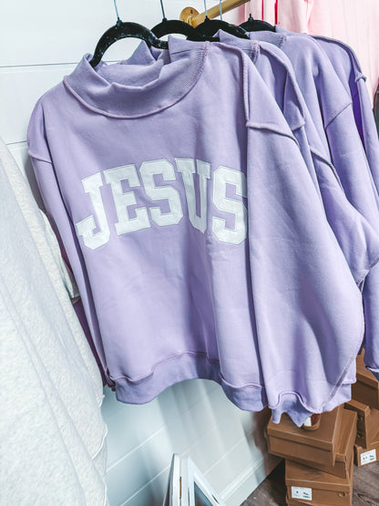 purple jesus embroidered mock neck