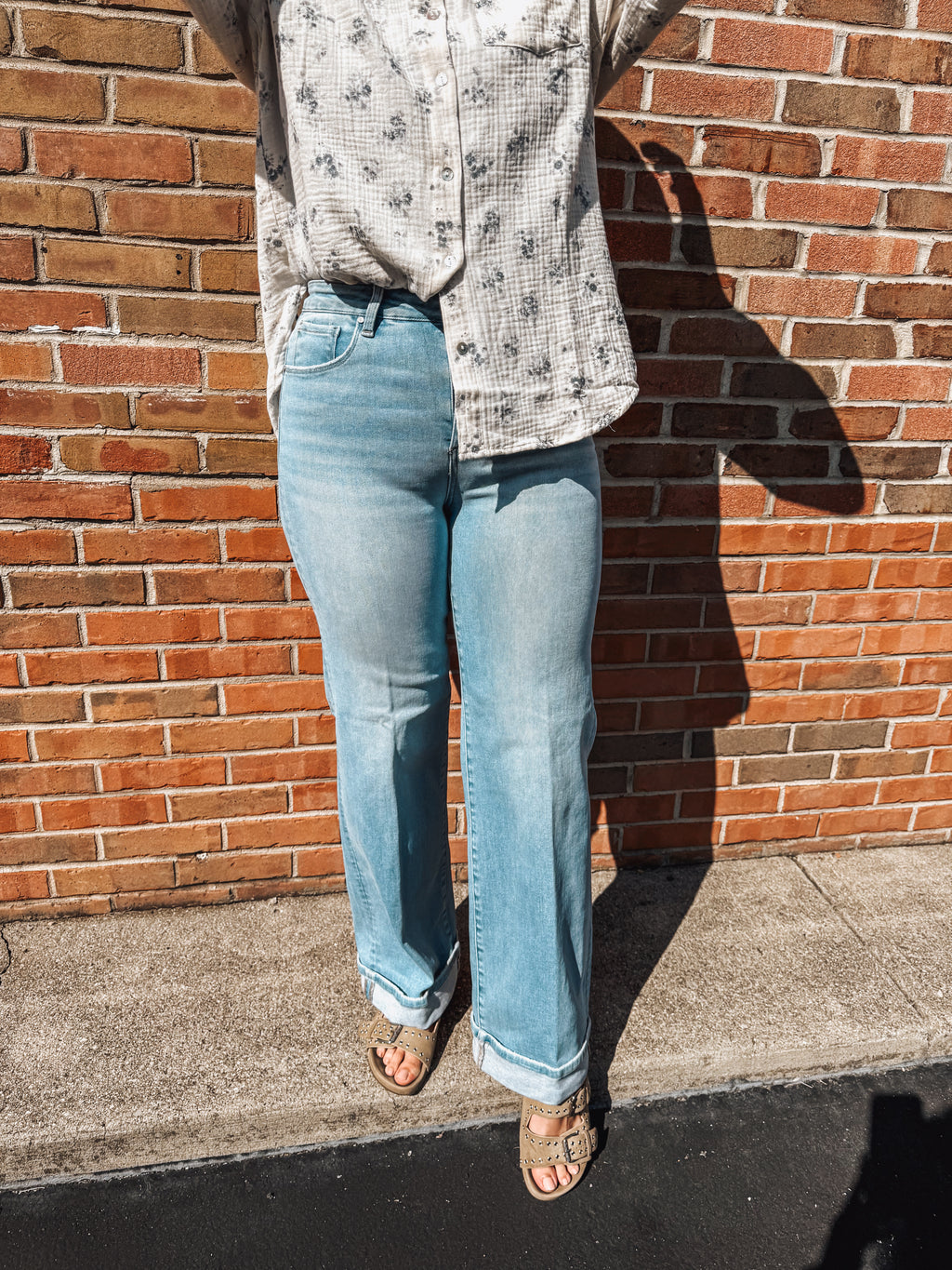 high rise Tummy Control light wash wide leg cuff jeans