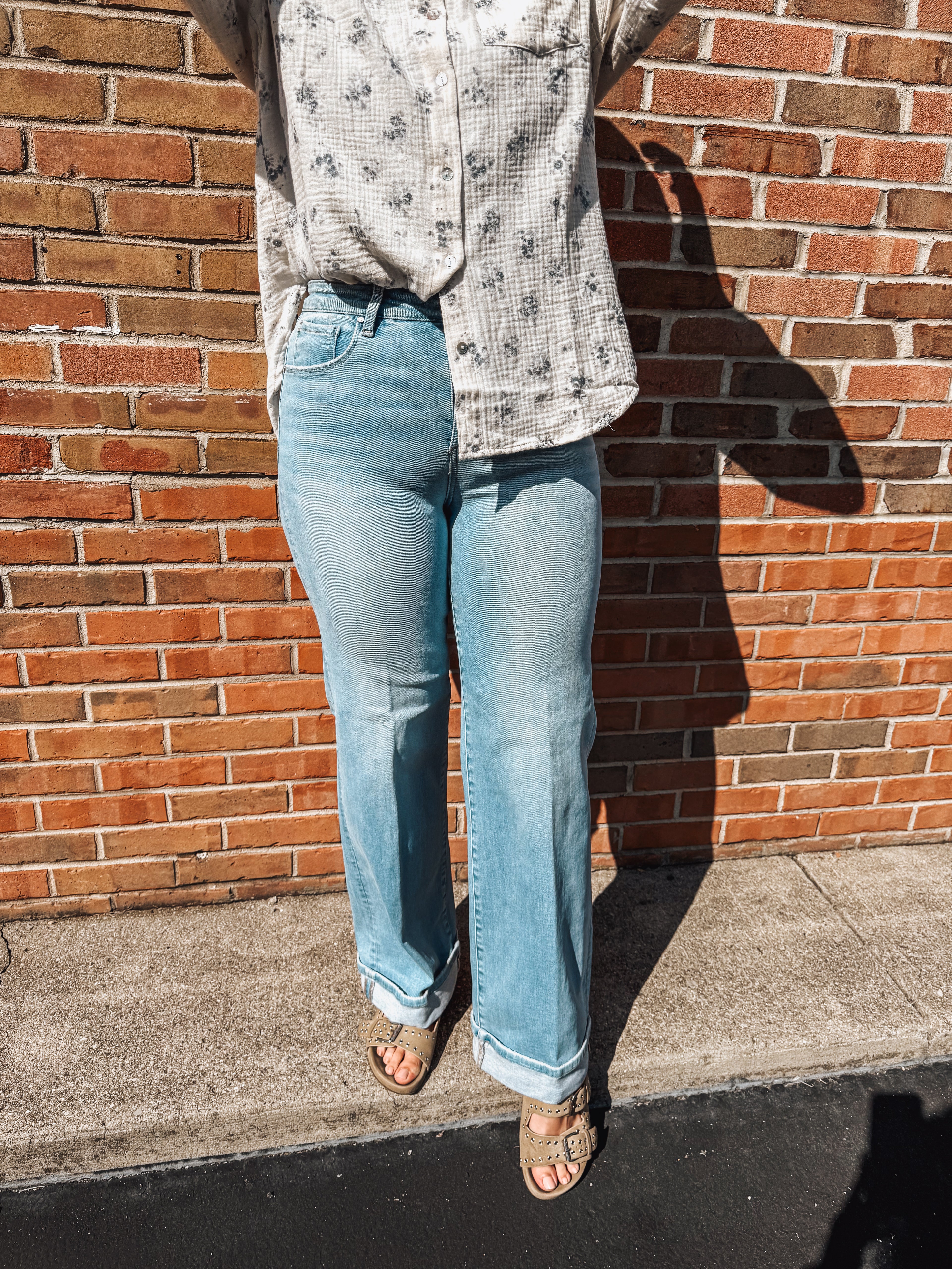 high rise Tummy Control light wash wide leg cuff jeans