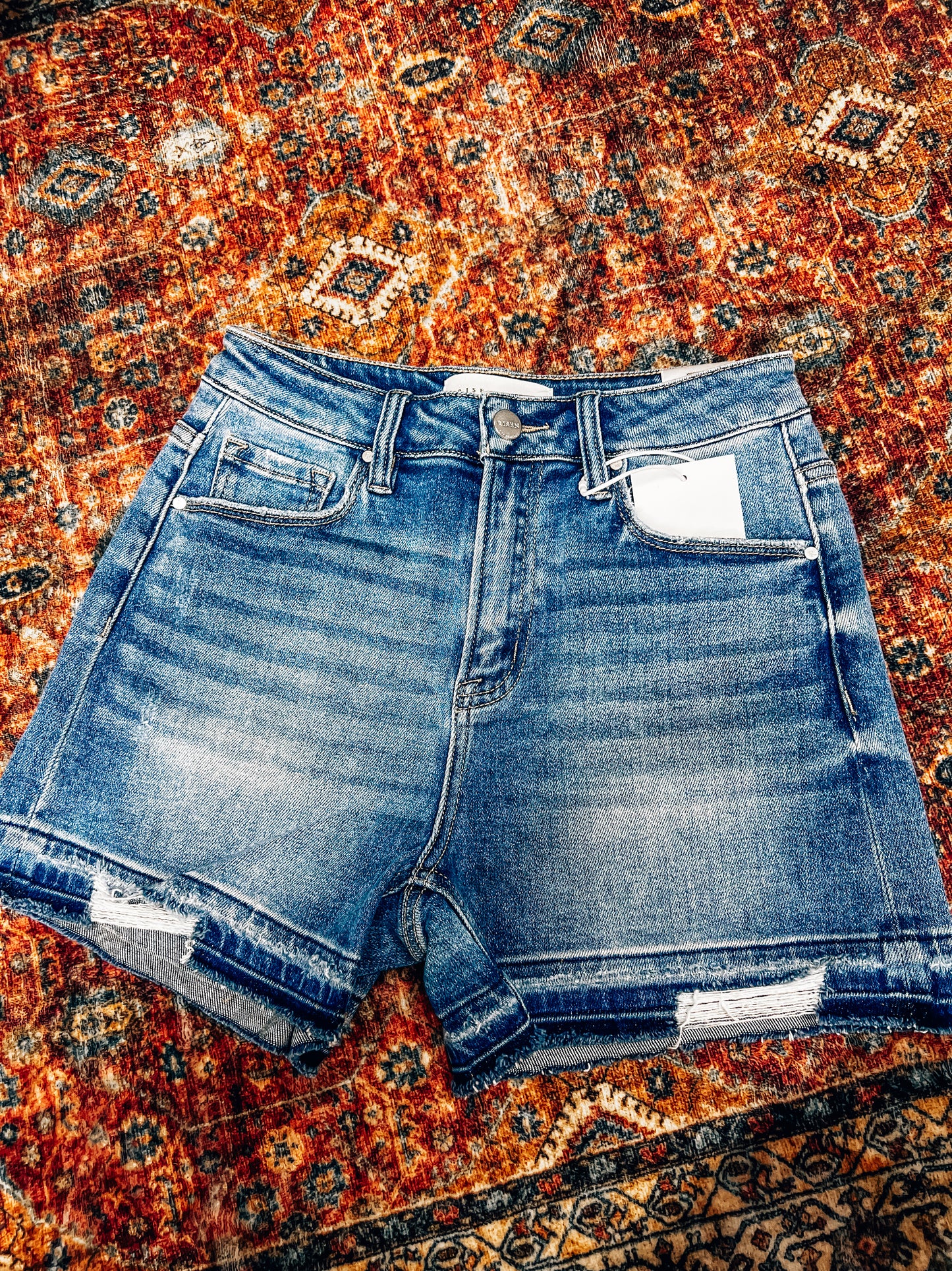 medium wash risen shorts