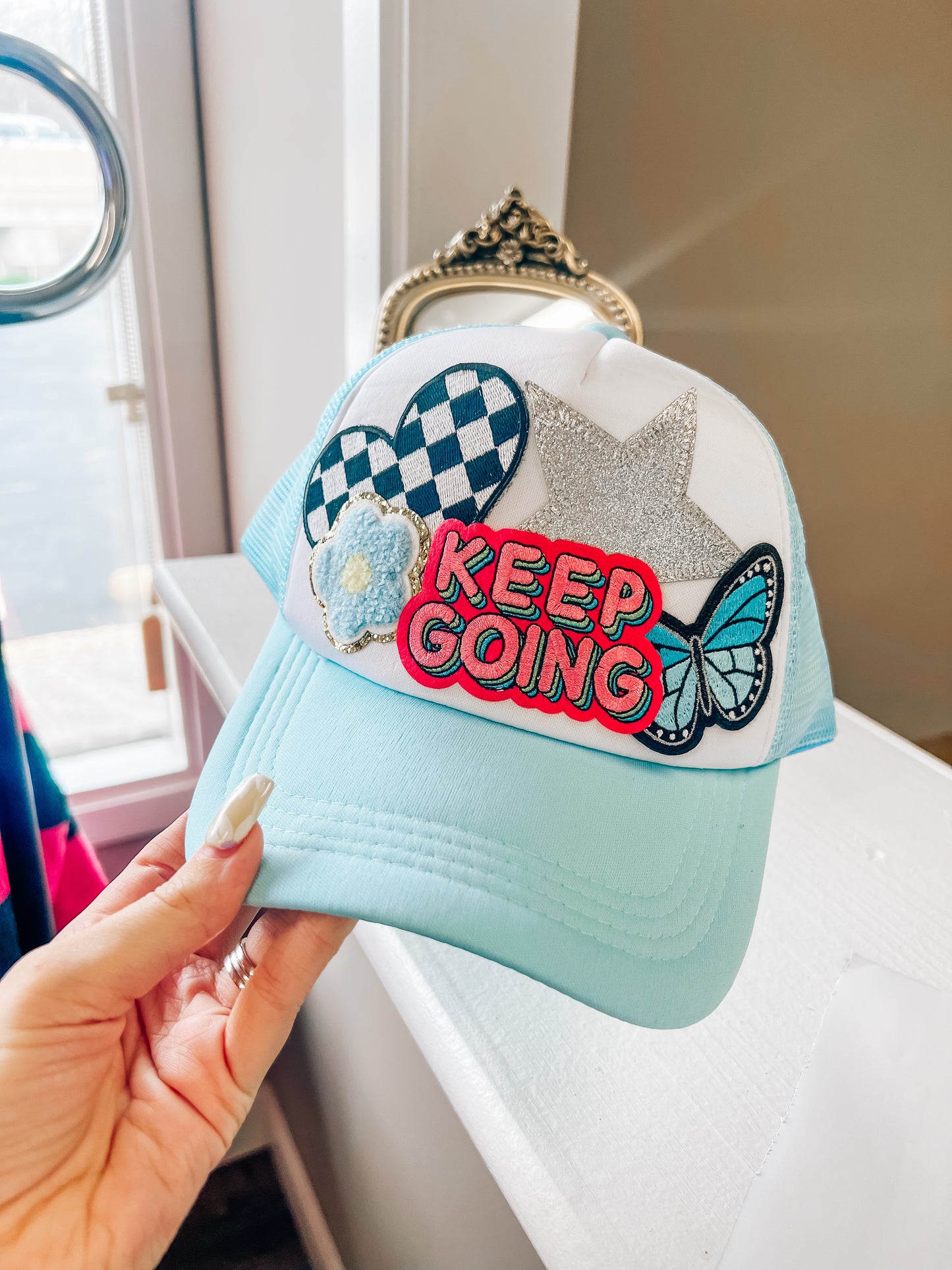 Keep going trucker hat