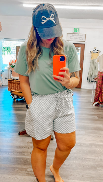 grey and white paper bag waist shorts