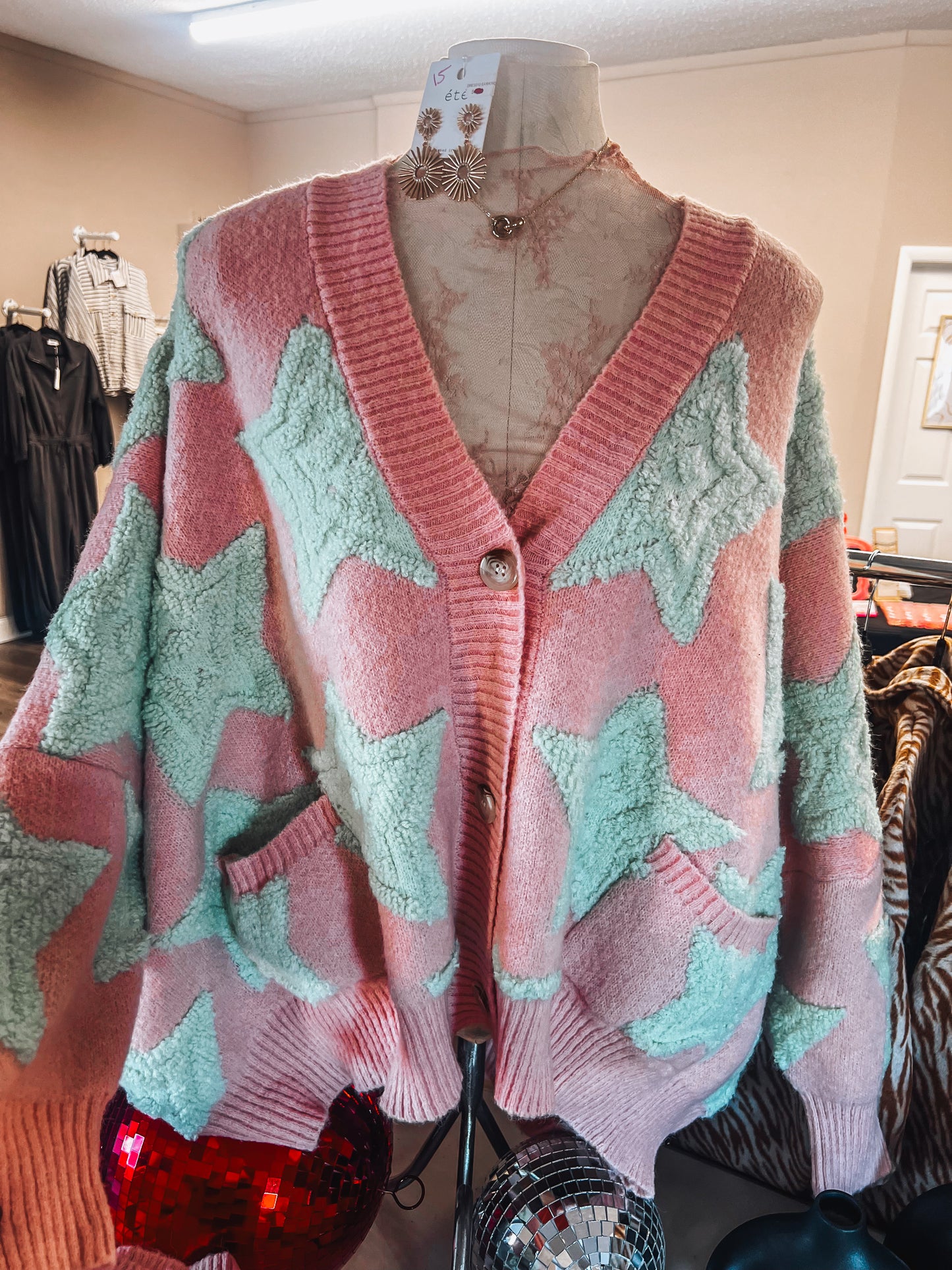 pink and blue star oversized sweater