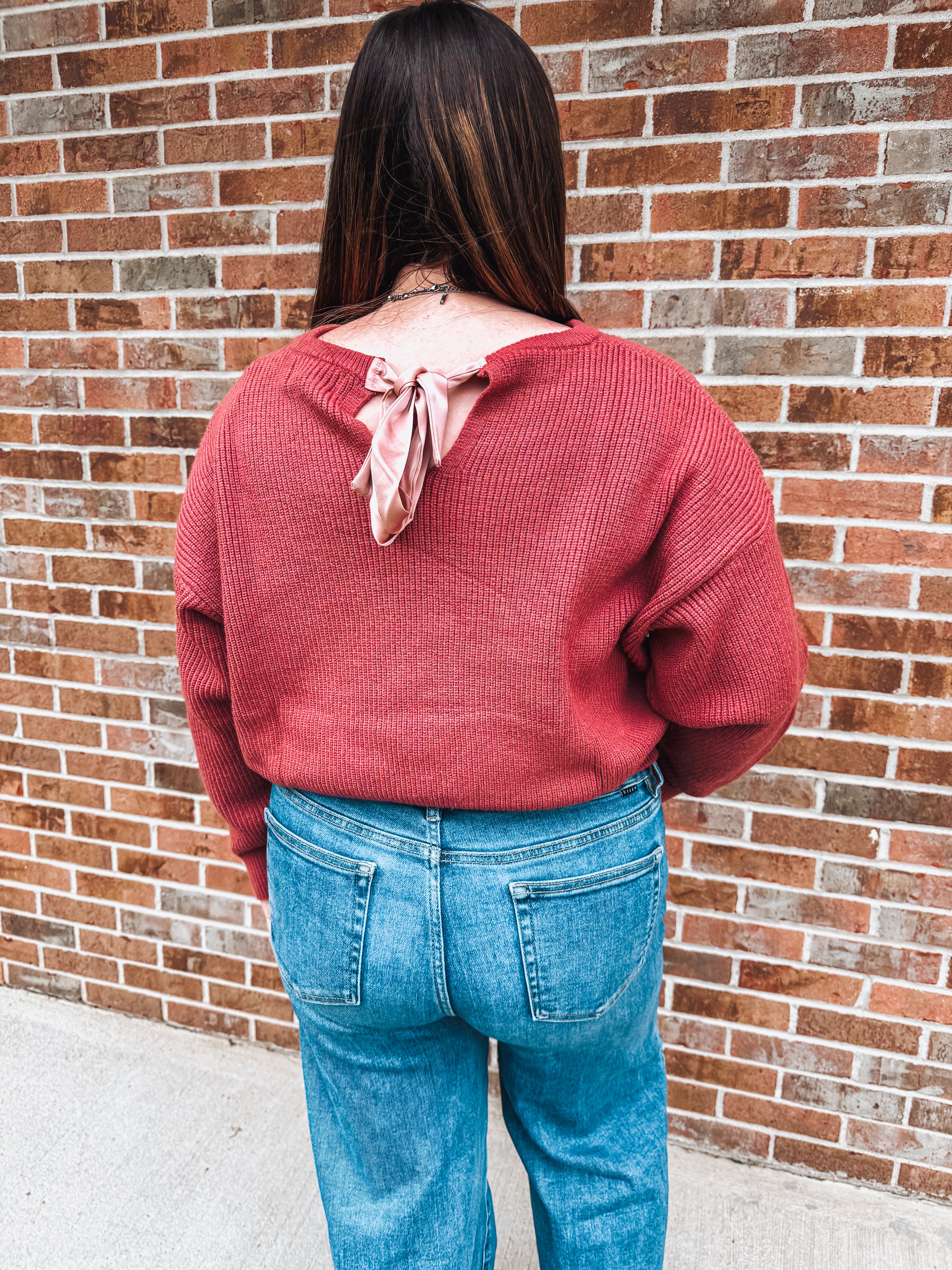rose fall sweater with bow tie detail in the back