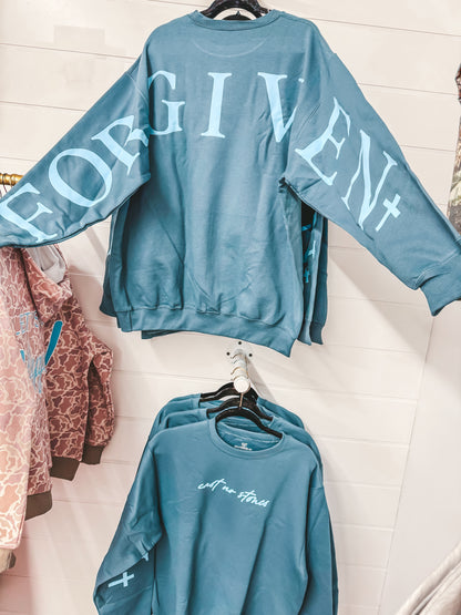 cast no stones-forgiven blue pullover