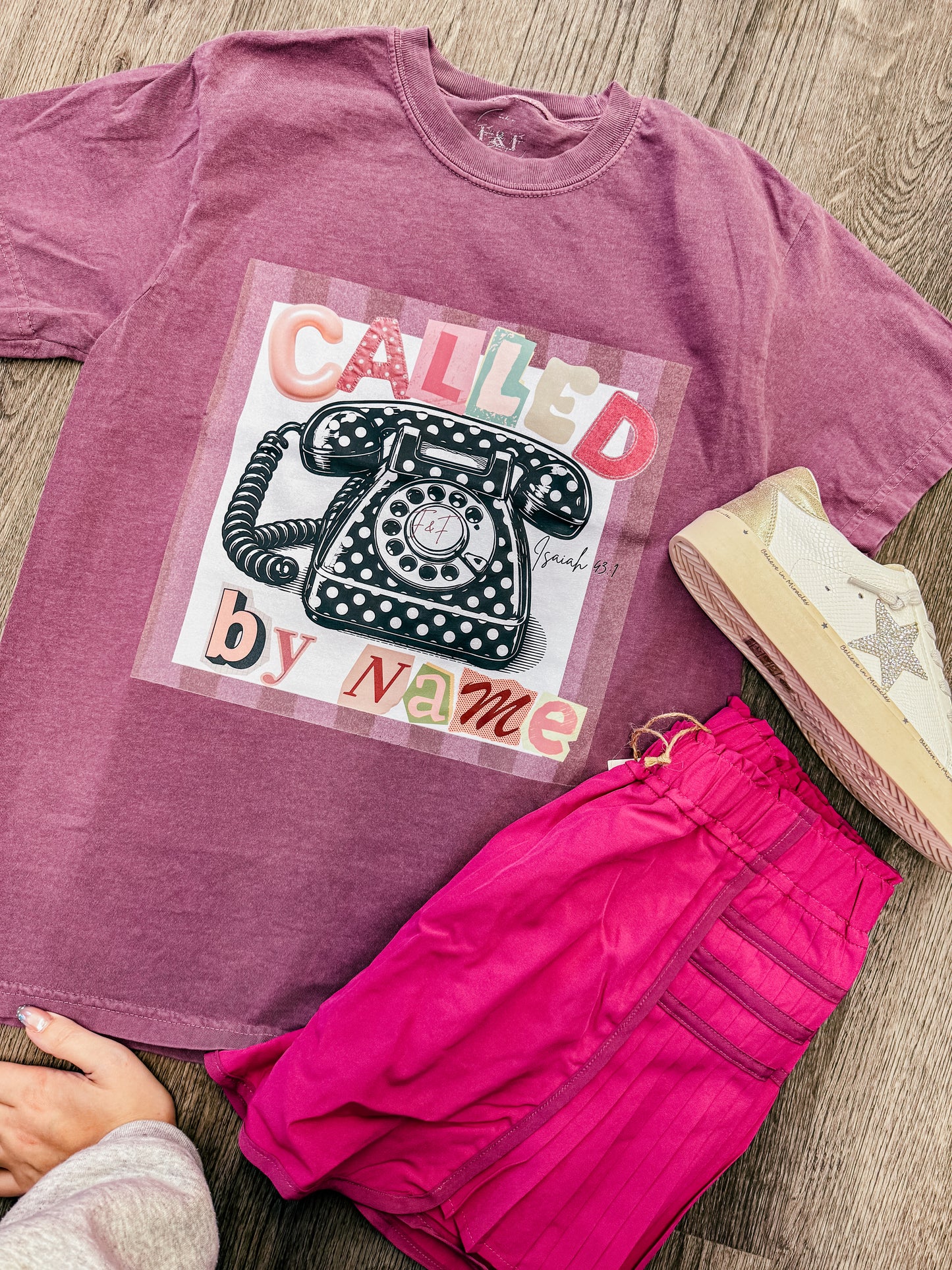 Called by name-branded tee