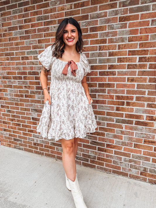 autumn floral dress with puff sleeve and bow detail