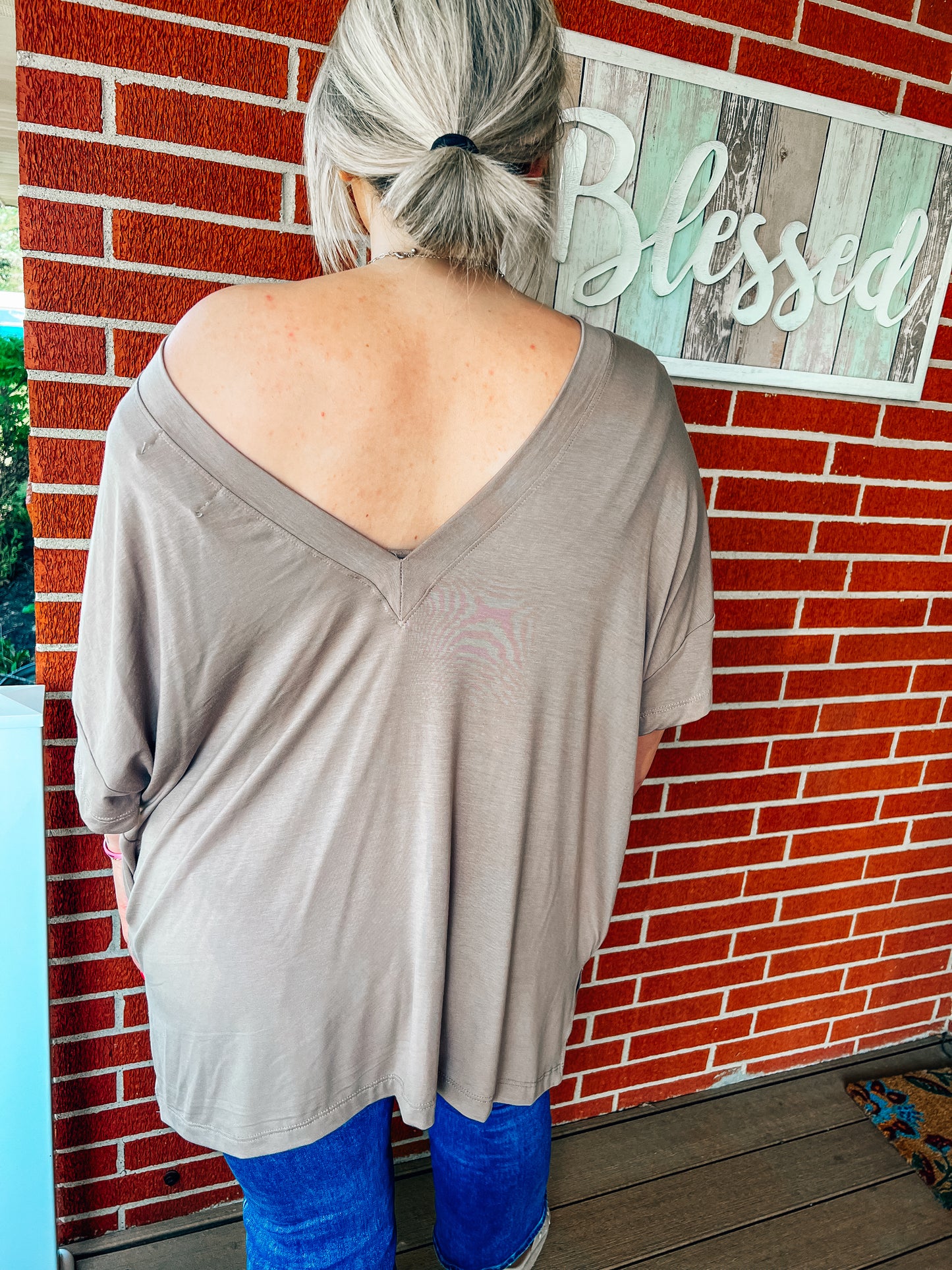 oversized reversible top with pockets in taupe