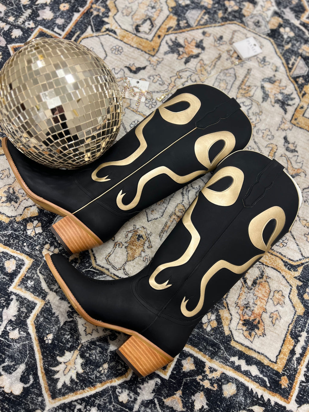 signature black and gold bow boots