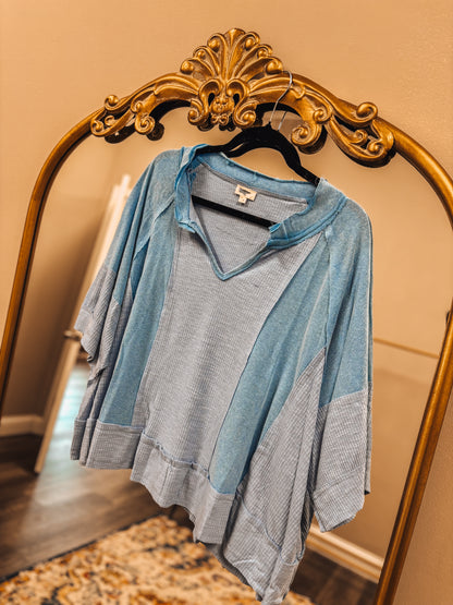 oversized notched neck frayed edge contrast knit top