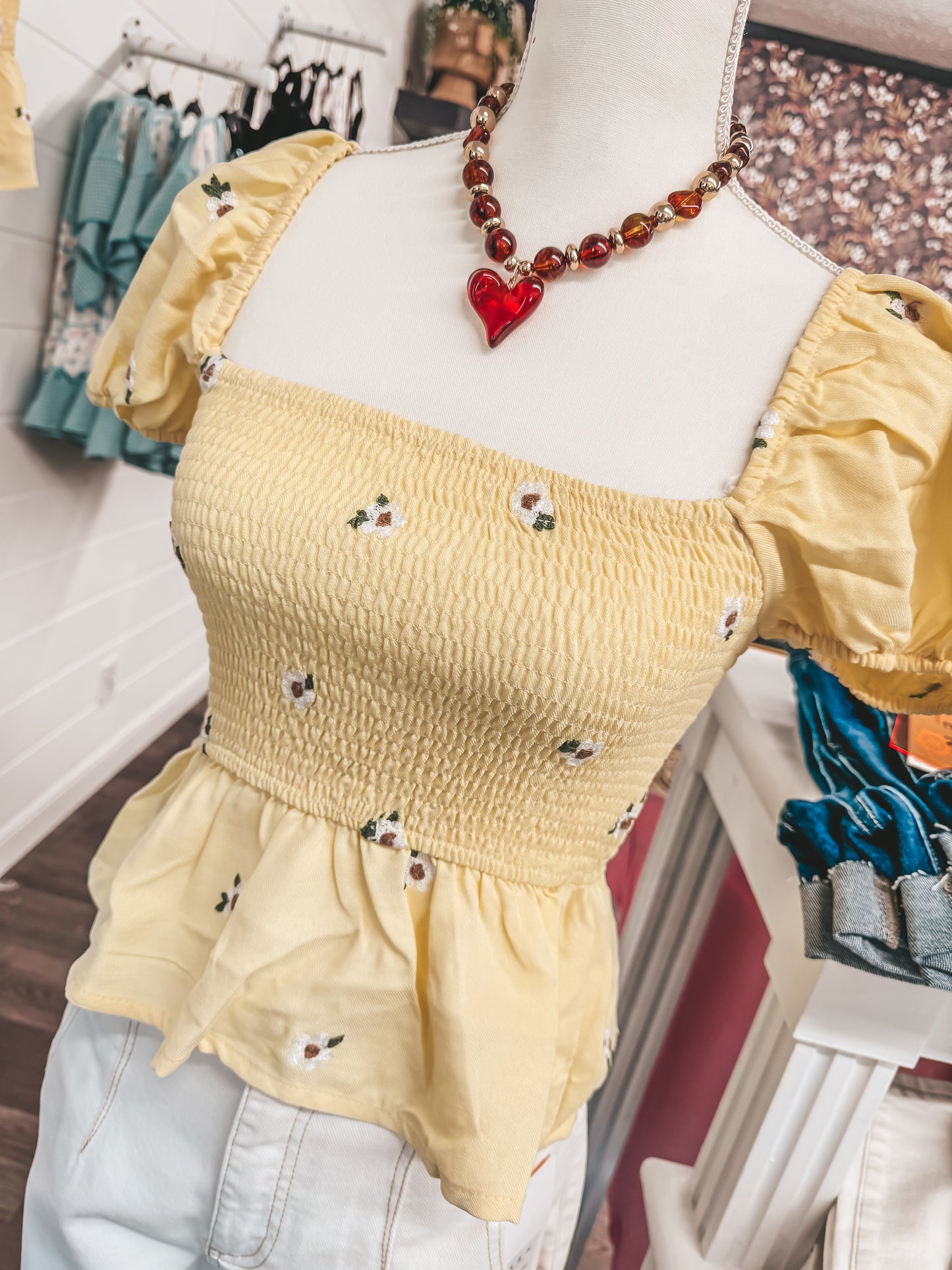 yellow floral embroidered smocked top