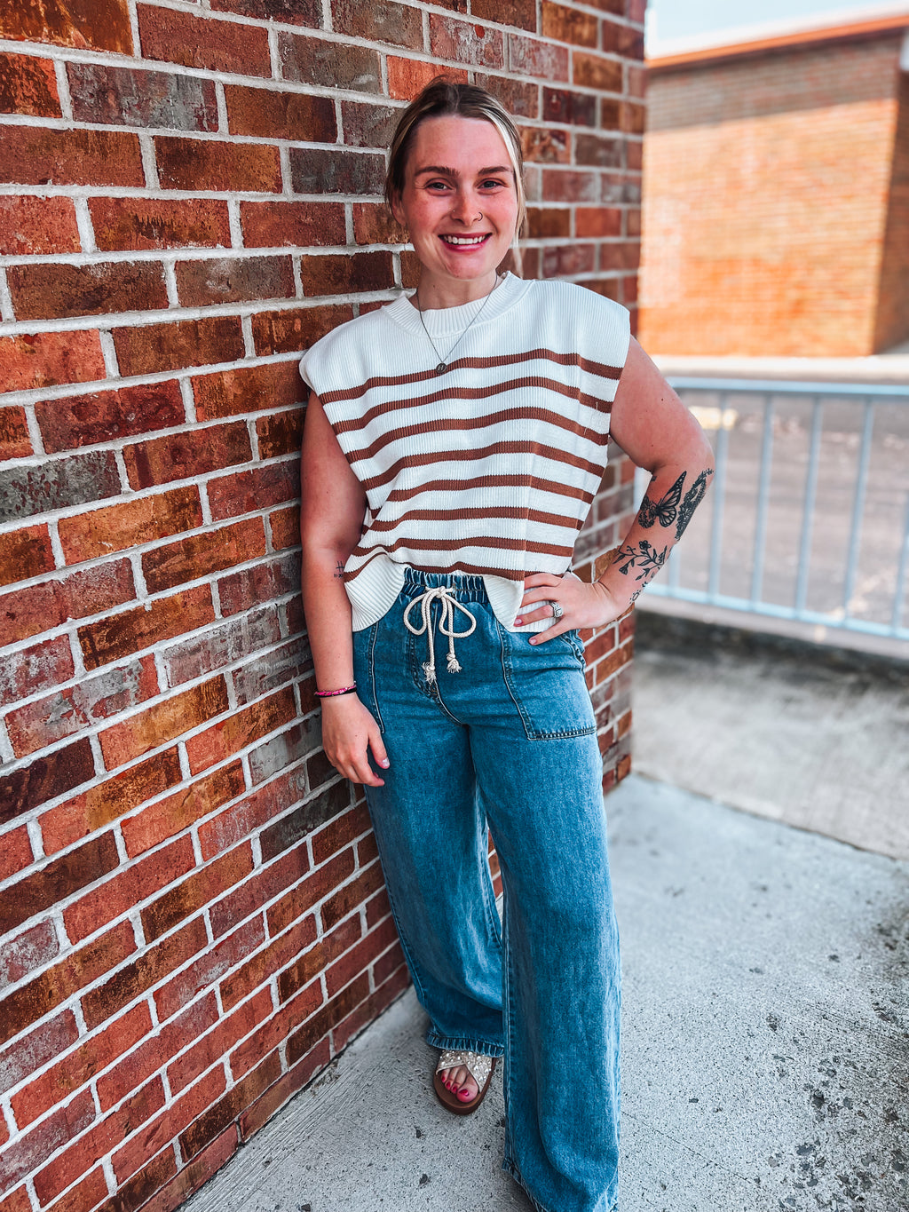 striped sleeveless sweater top