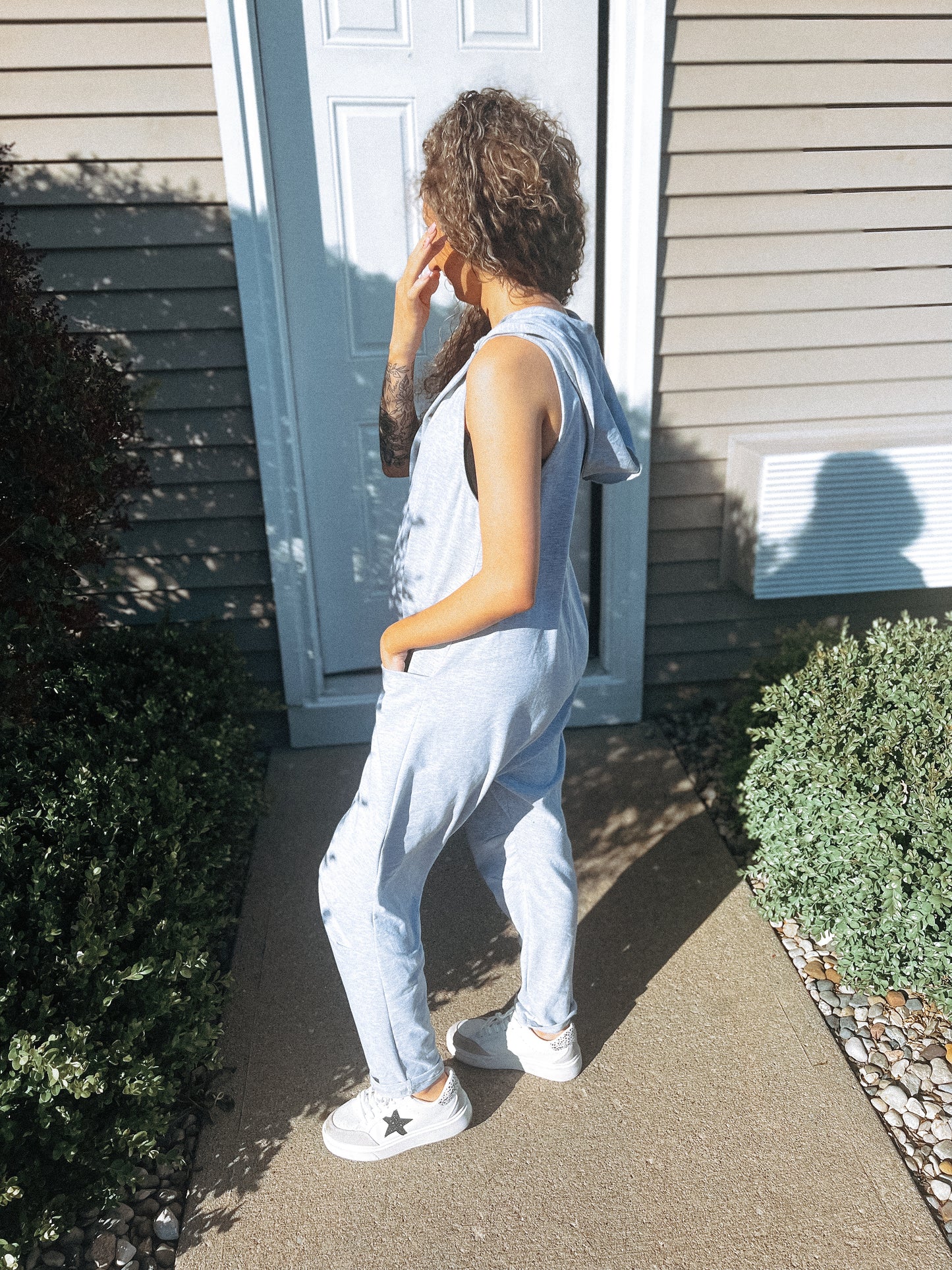 grey hooded jumpsuit