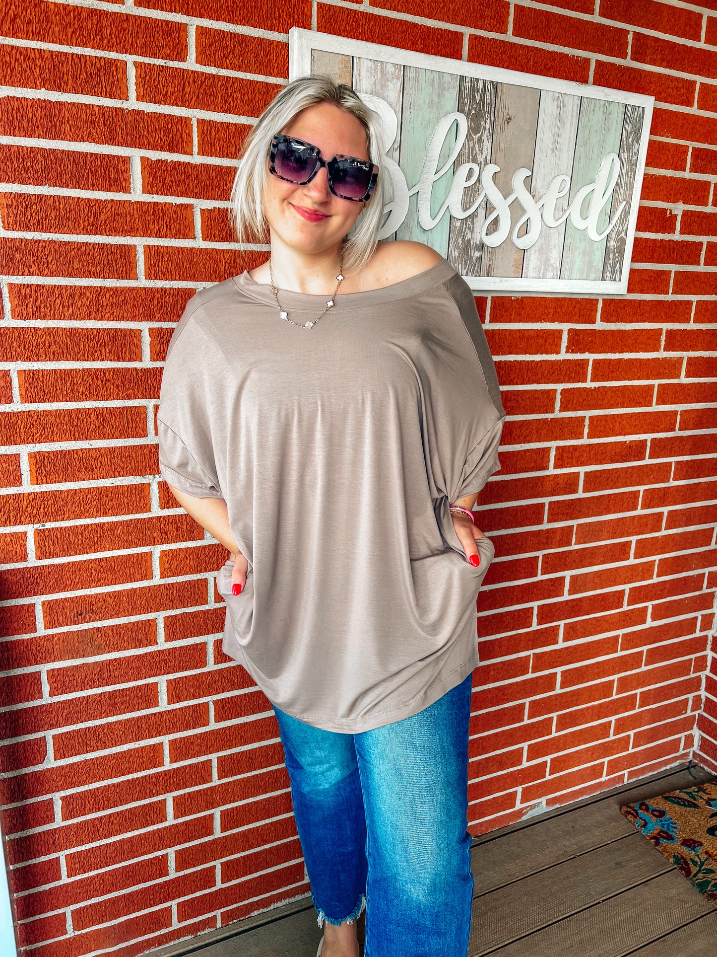 oversized reversible top with pockets in taupe