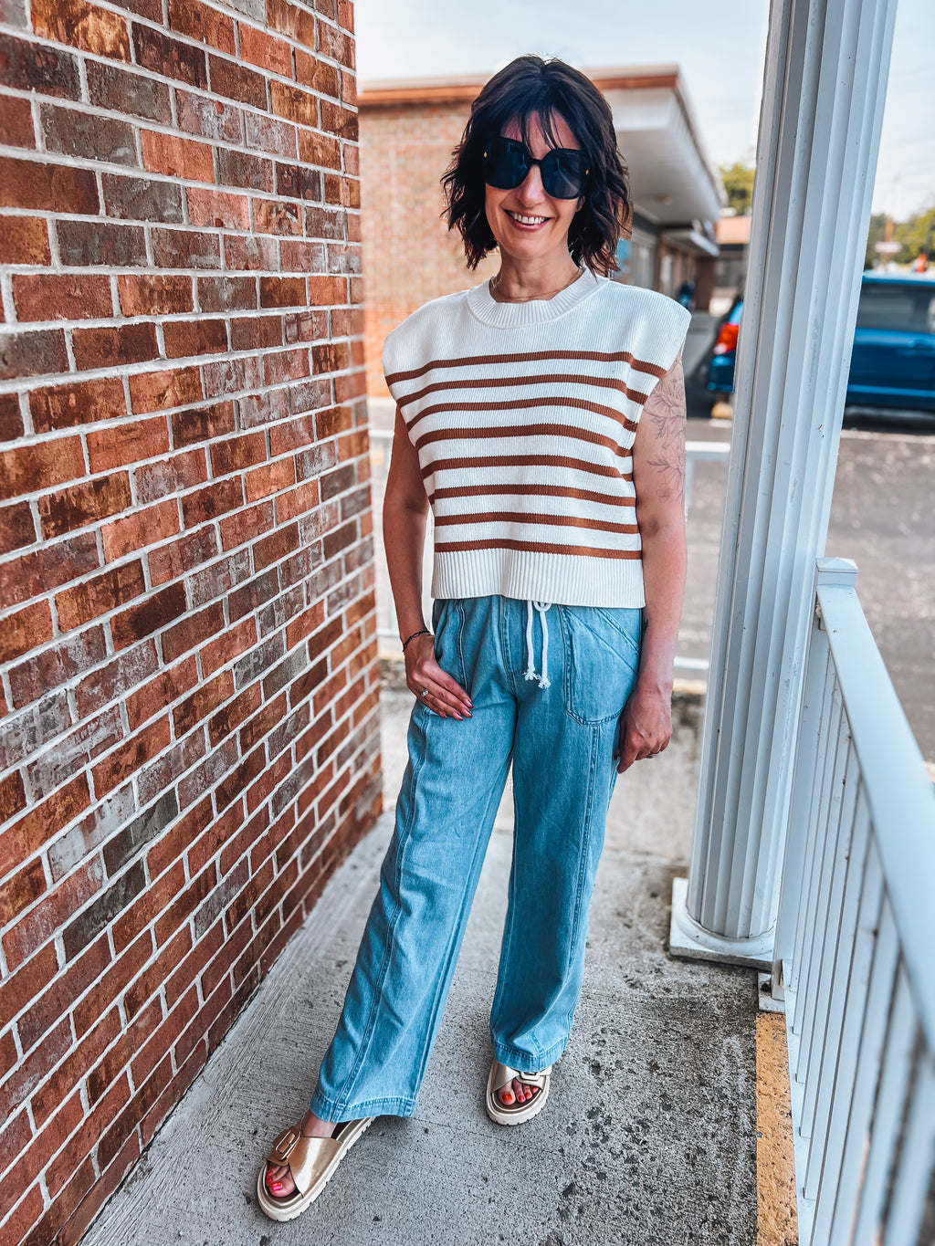striped sleeveless sweater top