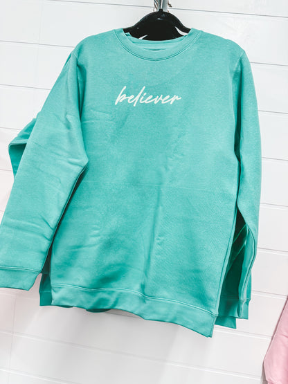 believer-faith teal pullover