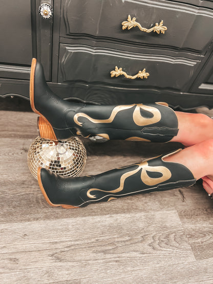 signature black and gold bow boots
