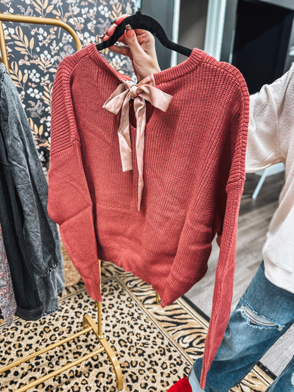 rose fall sweater with bow tie detail in the back