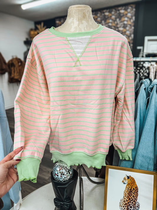 pink and green striped top with lettuce hem
