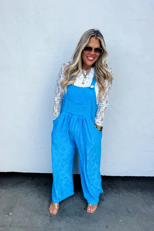 blue floral overall jumpsuit