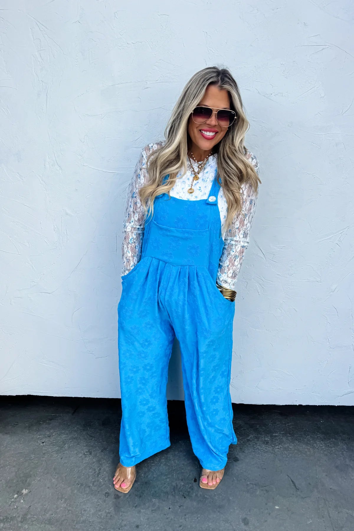 blue floral overall jumpsuit